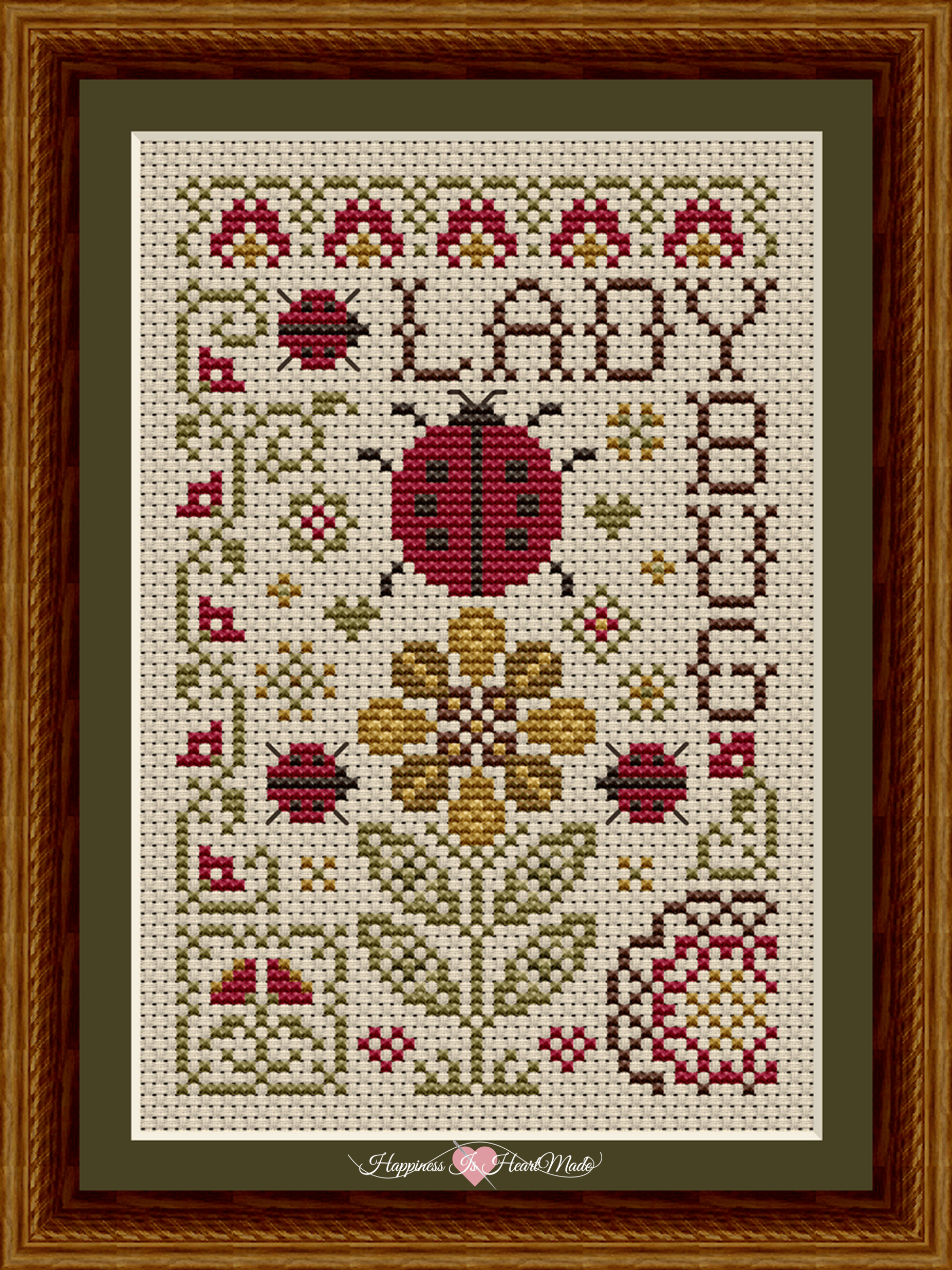Gathered from the Garden Ladybug Cross Stitch Pattern 1522 from Happiness Is HeartMade.  Framed image for display.