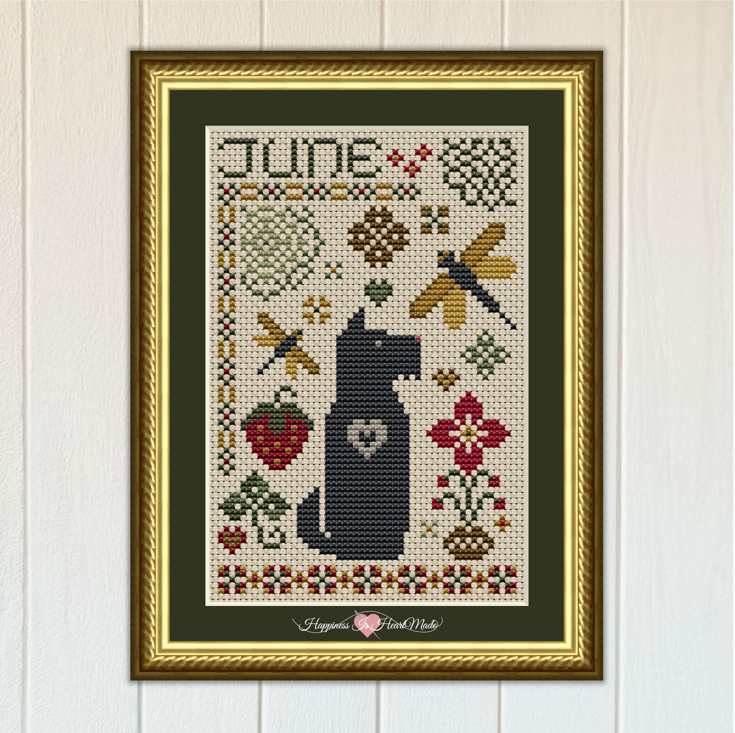The Scottie June Dog Cross Stitch Pattern 6556-S from The Dog Days Series by Happiness Is HeartMade. A cheerful summer cross stitch design with dragonflies, hearts, flowers, and a huge summer strawberry.